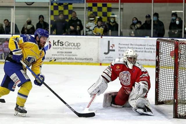 FIRST STRIKE: Leeds Knights' Matty Davies puts pressure on Renny Marr's goal at The Link Centre on Friday night. Picture courtesy of David North/Swindon Wildcats.