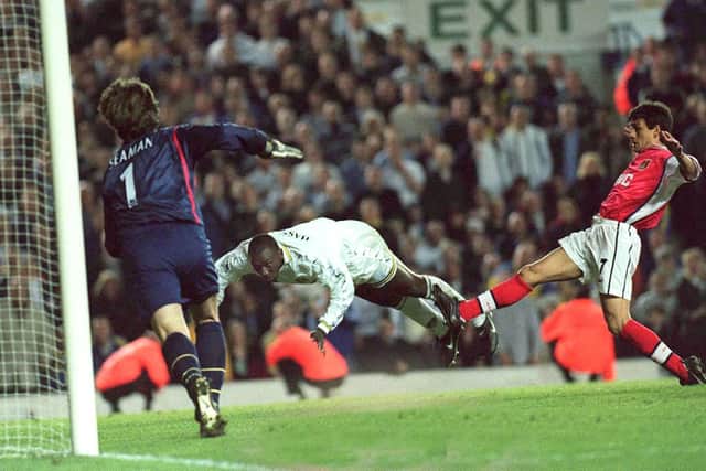 DECISIVE: Jimmy Floyd-Hasselbaink arrives at the back post to head home Harry Kewell's cross to give Leeds United a 1-0 victory at home to Arsenal back in May 1999. Picture by John Giles/PA.