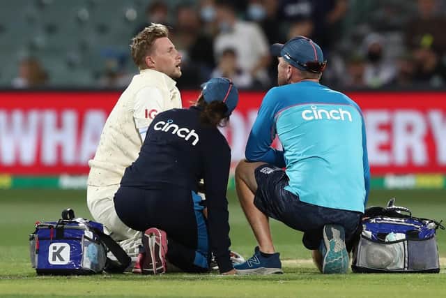 Ouch: Joe Root after being struck during day four of the second Ashes Test.