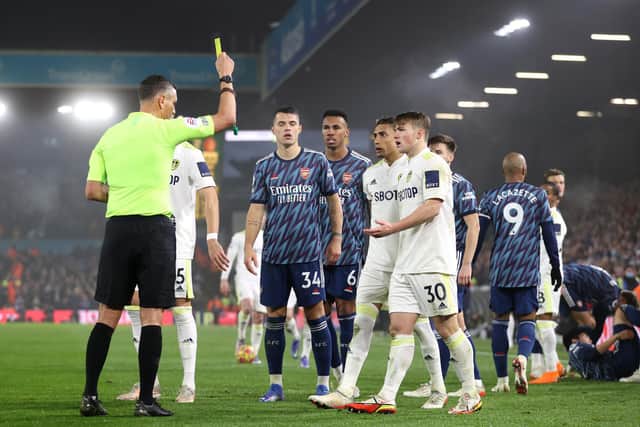 SIMILAR CHALLENGE - Dermot Gallagher felt Andre Marriner should have booked Granit Xhaka for a tackle on Leeds United winger Raphinha, before carding Joe Gelhardt for his challenge on Arsenal's Takehiro Tomiyasu. Pic: Getty