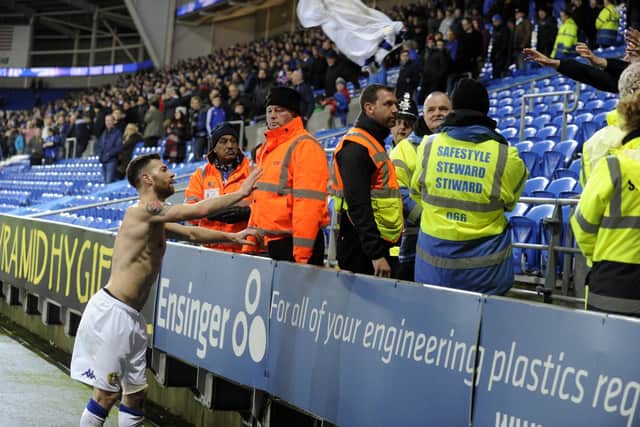 Mirco Antenucci throws his shirt to a fan after Leeds United's Championship clash against Cardiff City at the Cardiff City stadium in March 2016. PIC: Bruce Rollinson