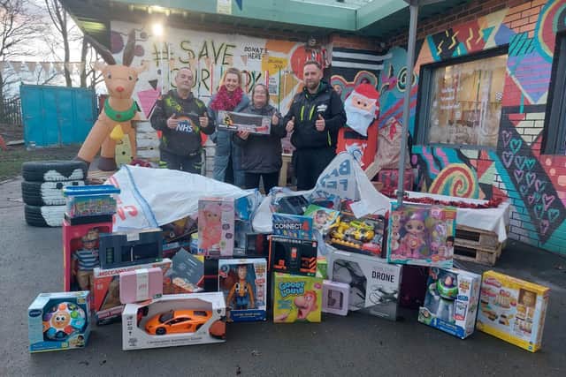 Reese Fletcher has donated toys to children. Picture: SWNS.