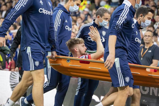 Liverpool midfielder Harvey Elliott is stretchered off during Leeds United's 3-0 defeat to the Reds in September 2021. Pic: Tony Johnson.