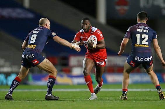 Muizz Mustapha, playing for Hull KR, takes on new Rhinos teammate James Bentley and St Helens' James Roby in a game last season. Picture by Ed Sykes/SWpix.com.