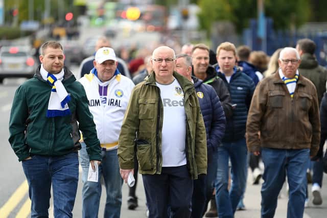 Leeds United fans walk down Elland Road on matchday. Pic: Michael Regan.