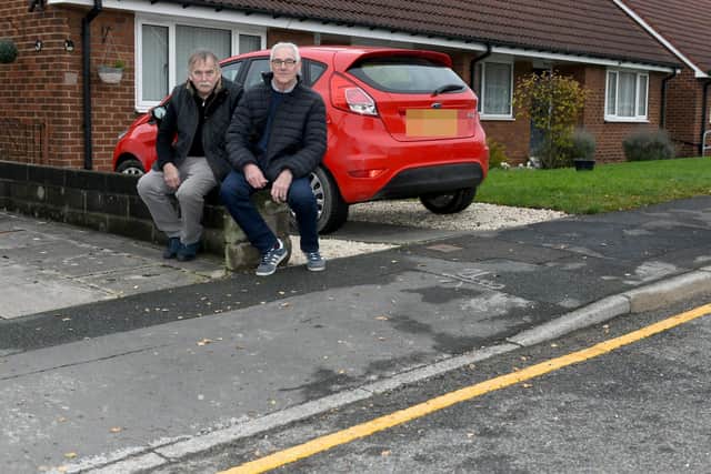 Caption:Phil Roche (left) and Chris Smith on Ringway in Garforth where new parking restrictions have been imposed.

Photo:Gary Longbottom