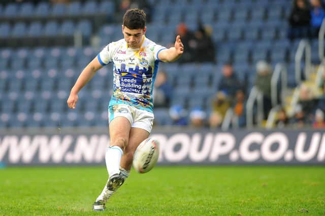 Jack Sinfield lands one of his two goals for Rhinos in their Boxing Day win over Wakefield. Picture by Steve Riding.