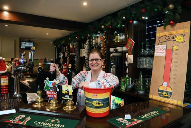 Garforth landlady Jo Heywood has raised more than £11,000 for the Yorkshire Air Ambulance after a series of fundraising efforts this year. She said she couldn't have done it without her team and support from the community. Photo: Jonathan Gawthorpe.