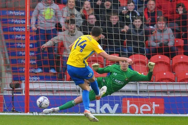 Spot on: Ross Stewart of Sunderland sends Doncaster goalkeeper Louis Jones the wrong way to score from the penalty spot. Picture: Steve Riding