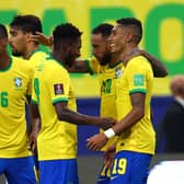 Leeds United winger Raphinha (right) in action for Brazil earlier this year. Pic: Getty