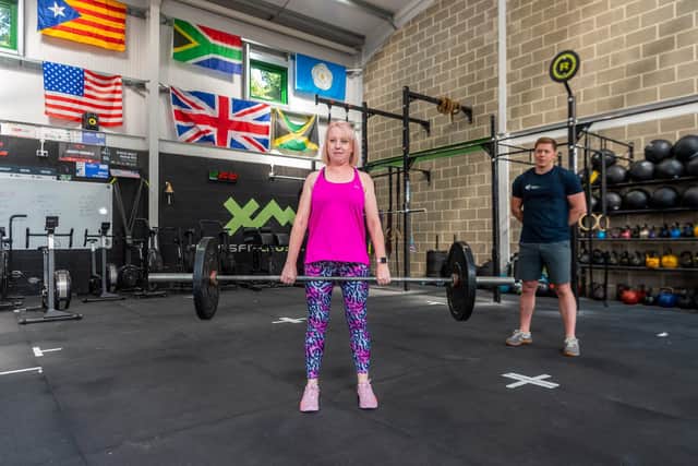 Laura Collins and personal trainer Chris Hull.