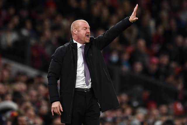 WAITING GAME: For Burnley boss Sean Dyche, pictured during Thursday night's 4-1 defeat to Manchester United at Old Trafford. Photo by OLI SCARFF/AFP via Getty Images.