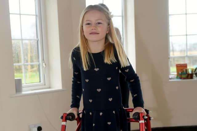 Eight-year-old Amelie Round was diagnosed with Hereditary Spastic Paraplegia (HSP) four years ago, a lifelong and progressive condition (Photo: Gary Longbottom)