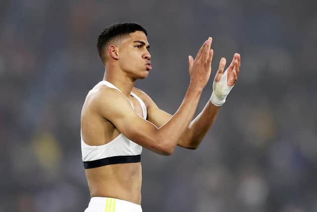 SOLIDARITY: Twenty-year-old right back Cody Drameh applauds Leeds United's fans after a patched-up Whites were beaten 4-1 by Arsenal at Elland Road. Photo by Naomi Baker/Getty Images.