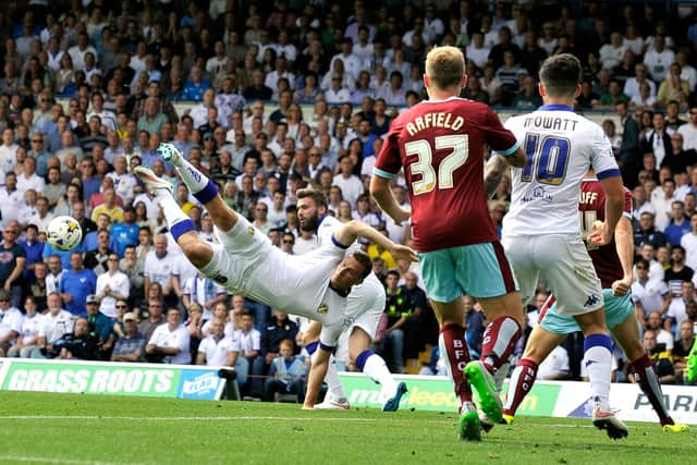 IN THE BEGINNING: Leeds United's Stuart Dallas, back, on his Whites debut back in August 2015 as Uwe Rosler's side face Burnley at Elland Road, the home XI also featuring Chris Wood, centre, and Alex Mowatt, right. Picture by Bruce Rollinson.