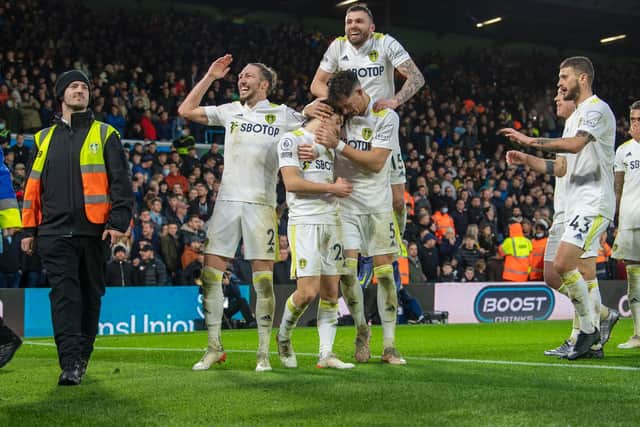 JOB DONE: Leeds United celebrate after Dan James puts them 3-1 up against Burnley at Elland Road. Picture by Tony Johnson.