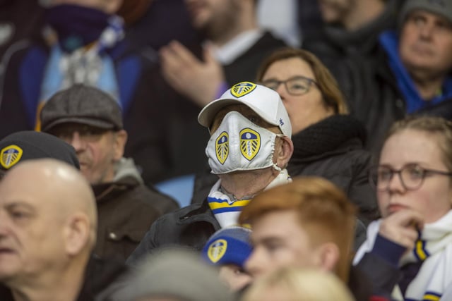 A fan proudly flies the flag for Leeds.