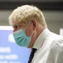 Prime Minister Boris Johnson during a visit to a vaccination hub in the Guttman Centre at Stoke Mandeville Stadium in Aylesbury, Buckinghamshire. PA.