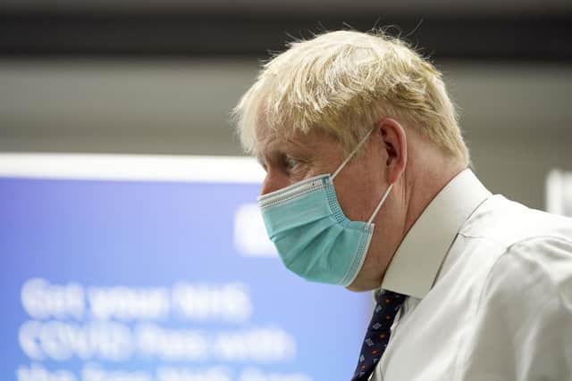 Prime Minister Boris Johnson during a visit to a vaccination hub in the Guttman Centre at Stoke Mandeville Stadium in Aylesbury, Buckinghamshire. PA.