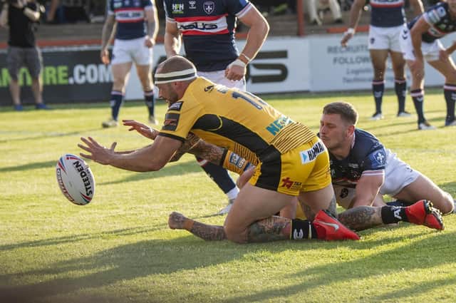 George Griffin scores for Tigers against Wakefield last June. Picture by Tony Johnson.