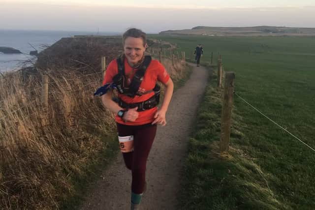 Sarah Norman pictured taking part in the  gruelling Hardmoors 30 across North York Moors on Saturday January 1.