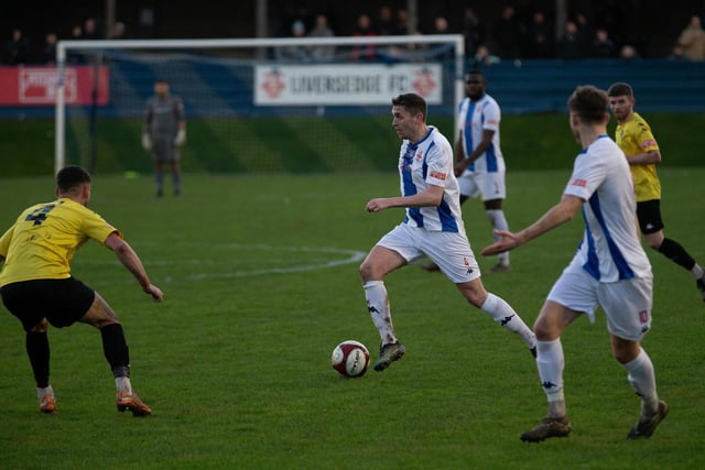 Liversedge player Ross Daly strides forward.
