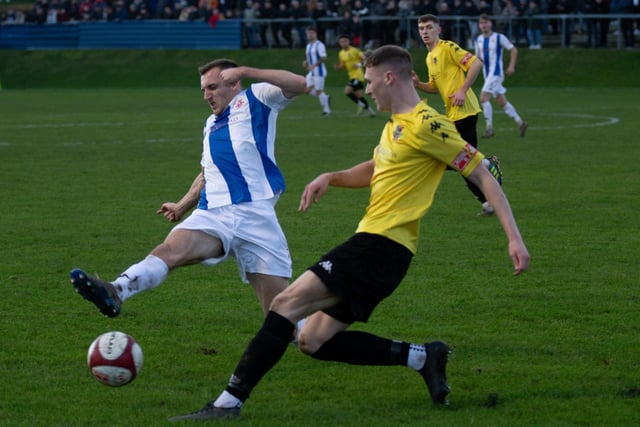 Liversedge's Oliver Fearon aims to block a pass from Jack Shepherd.