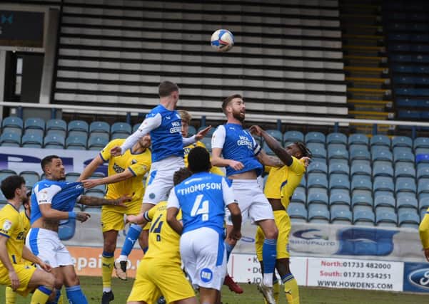 Posh centre-backs Mark Beevers and Frankie Kent at an attacking home corner. Photo: David Lowndes.