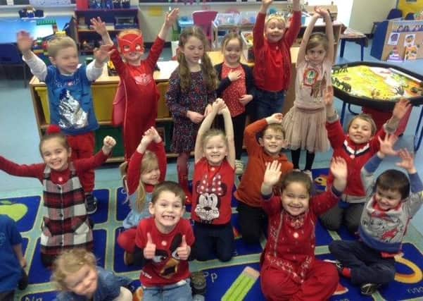 Enchanted Forest Class pupils at Caythorpe School on Red Nose Day. EMN-210320-112853001