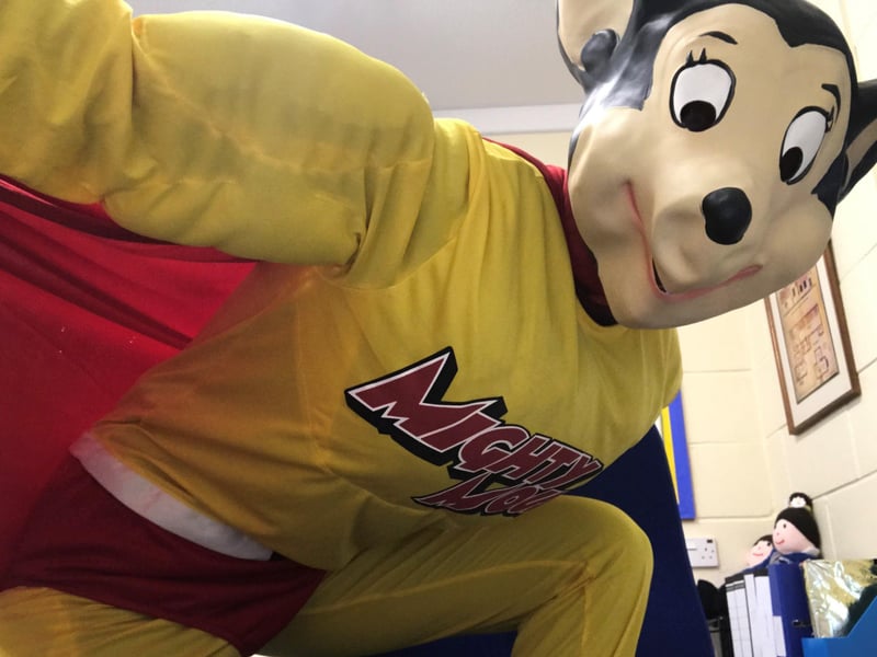 Winchelsea School head Helen Duckett greeted people at the gates as Mighty Mouse! EMN-210320-112945001