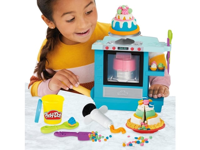 Make incredible Play-Doh cakes rise before your eyes with this toy oven baking playset. Add Play-Doh modeling compound to the cake pan, pop it in the oven, pull down the handle, and watch it rise. You'll even hear a "ding" sound to let you know when it's done and it's time to decorate! Great creative fun with endless possibilities for the kids.