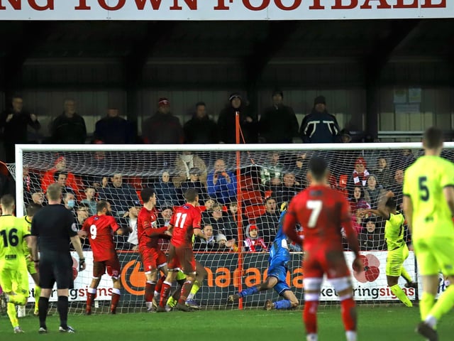 Jordan Cullinane-Liburd heads home Brackley's goal at Latimer Park