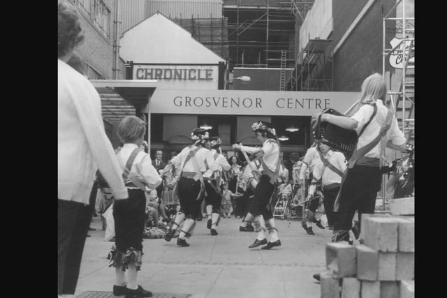 The old Grosvenor Centre, Morris dancing at Market Square entrance, date unknown