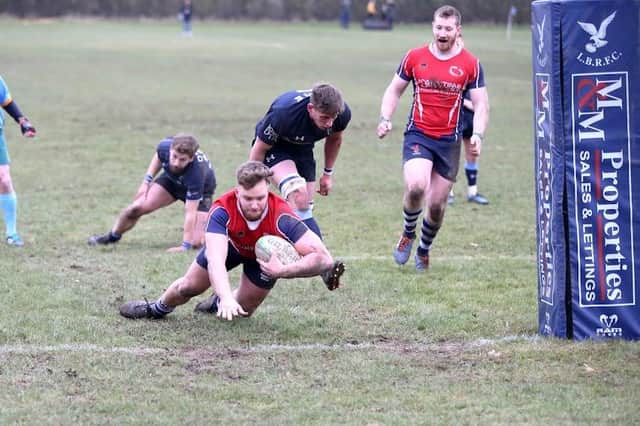 Lewis Morgan scores his second try for Buzzards against Eton Manor
