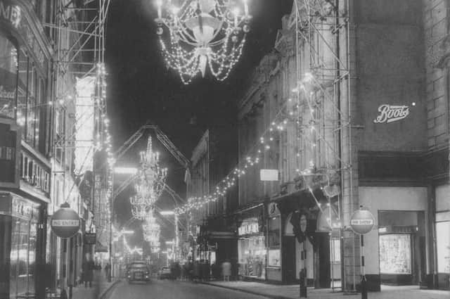 This view down Gold Street was taken in November 1961, the day after Northampton’s Christmas lights were turned on. About 2,000 people had packed into Gold Street to see actress Jacqueline Jones switch on the six chandeliers, which contacted more than 1,200 lights. At the time Gold Street claimed to be the brightest shopping street in the country outside London