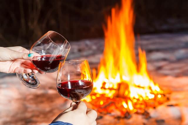 Nature’s TV - a fire outdoors - can often be the most romantic thing to snuggle up in front of