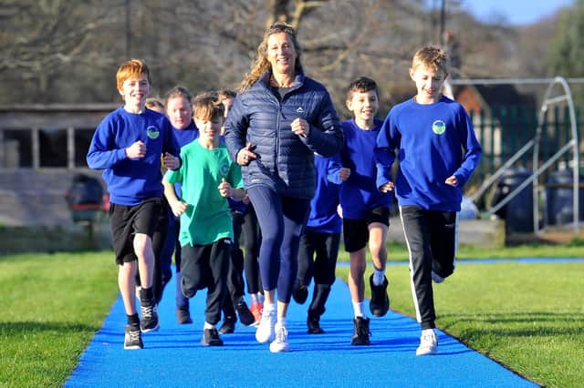 Sally Gunnell OBE opens a new school running track at Steyning Primary School. Pictures by Steve Robards