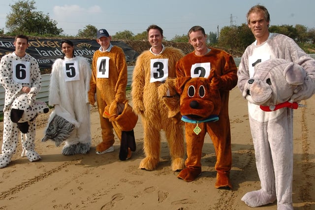 Human dog race at Peterborough Greyhound stadium, in aid of Sue Ryder Care
. Pictured getting ready for action are the Fisherprint team L-R: Paul Brice, Theresa Lindsay, Lee Gow, Jason Ellerby, Seth Wells, Steve Kelly