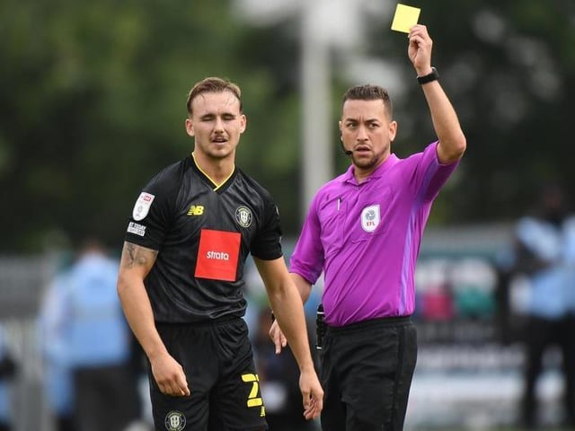 Referee Paul Howard shows a yellow card to Jack Diamond. Harrogate have had one player sent off this season.

Photo: Getty Images