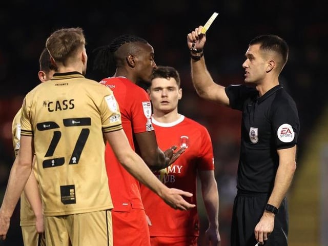 Omar Beckles of Leyton Orient is shown a yellow card.
Photo: Getty Images