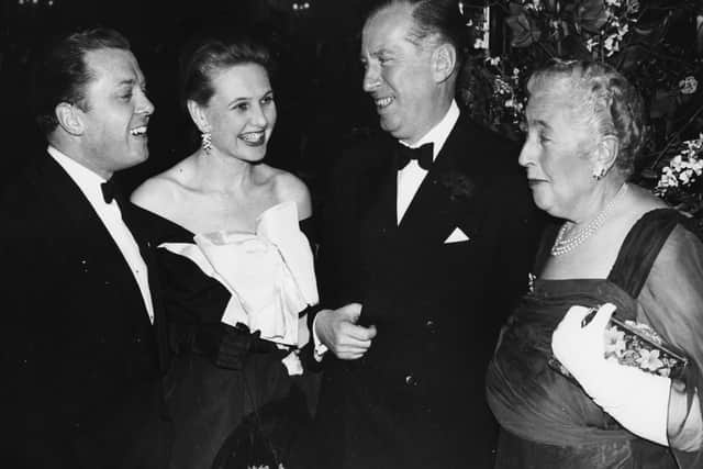 Author Agatha Christie (right) talking to impresario Peter Saunders (centre), actor Richard Attenborough and his wife Sheila Sim, at a party to celebrate her play 'The Mousetrap' (photo: Getty Images)