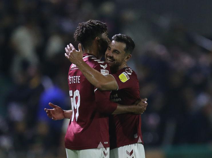 Kion Etete and Jordan Flores celebrate the victory at full-time. Pictures: Pete Norton.