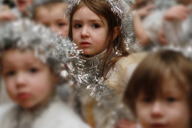 Clara Hutton from Long Tower PS as one of the angels in their recent Nativity Play.  (2312JB02)