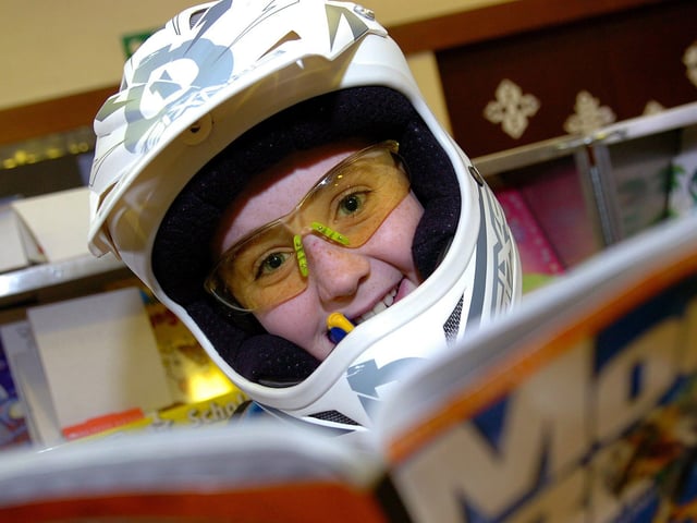 David enjoys his favourite book during Maghera Primary School's book fair in 2010.