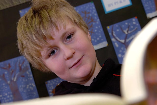 Maghera Primary School pupil Thomas enjoys his favourite book.