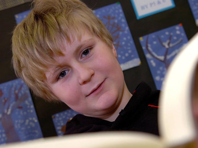 Maghera Primary School pupil Thomas enjoys his favourite book.