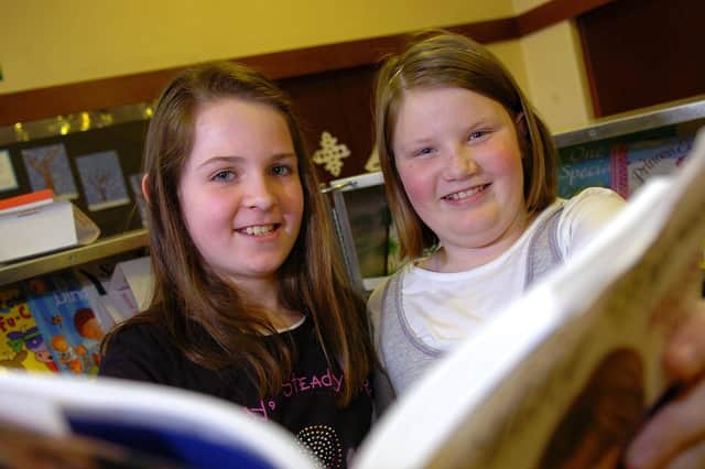 Zoë and Kristy pupils from Maghera Primary School delve into the books back in 2010.