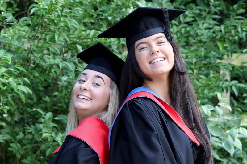 Classmates Megan Reid and Kerith McIlwrath from Belfast, celebrate as they graduate with a HND in Computing