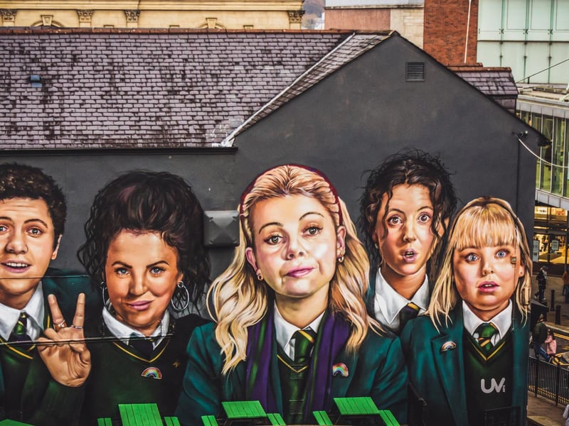 The iconic sitcom from Lisa McGee that covers life in 1990's Derry features plenty of filming locations across Northern Ireland. Including Derry's famous 400-year-old City Walls, murals and winding streets. The cast themselves now have a giant mural depicting them on Badger's Bar on Orchard Street, which has in itself became a popular spot for fans. The Belfast locations that make a feature include Smithfield Market, St Mary's University and Hunterhouse College.