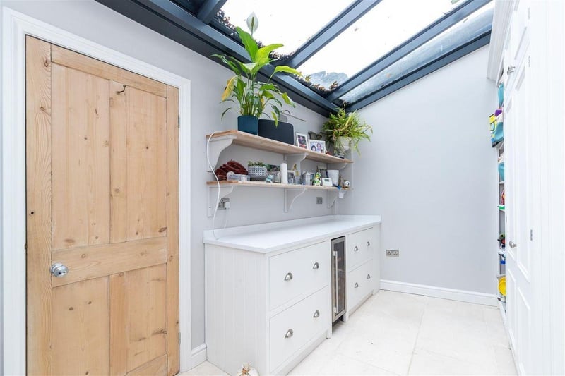 The home includes an attractive, light and airy utility room.